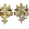 Coppia di appliques di design dorate