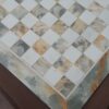 Tavolino quadrato piano con scacchiera in pietra dura
