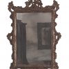 Antica specchiera vintage con cornice intagliata