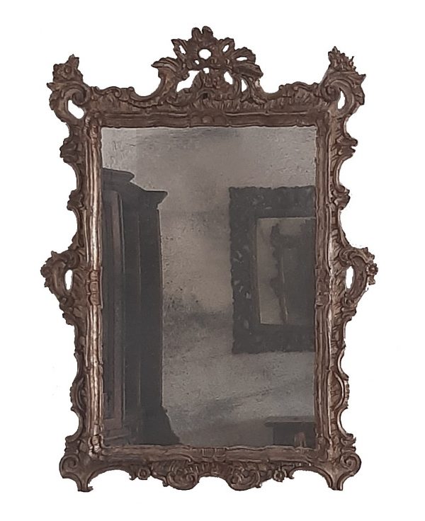 Antica specchiera vintage con cornice intagliata